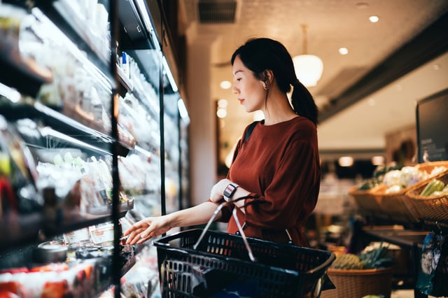 A woman shopping at the grocery store